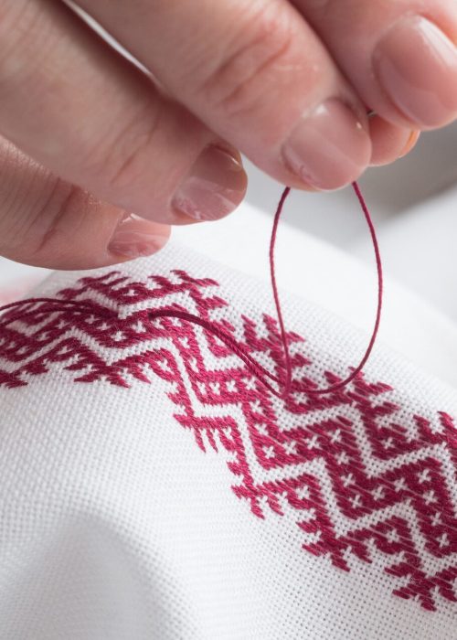 woman embroidering